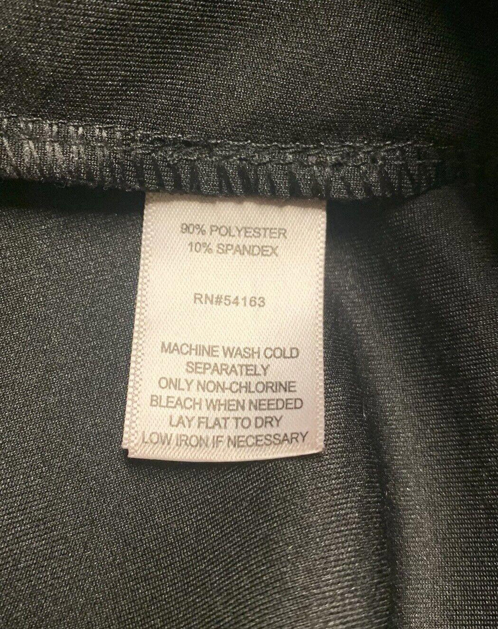 Pantalones negros con estampado de serpiente para mujer de Andrew Marc NY M