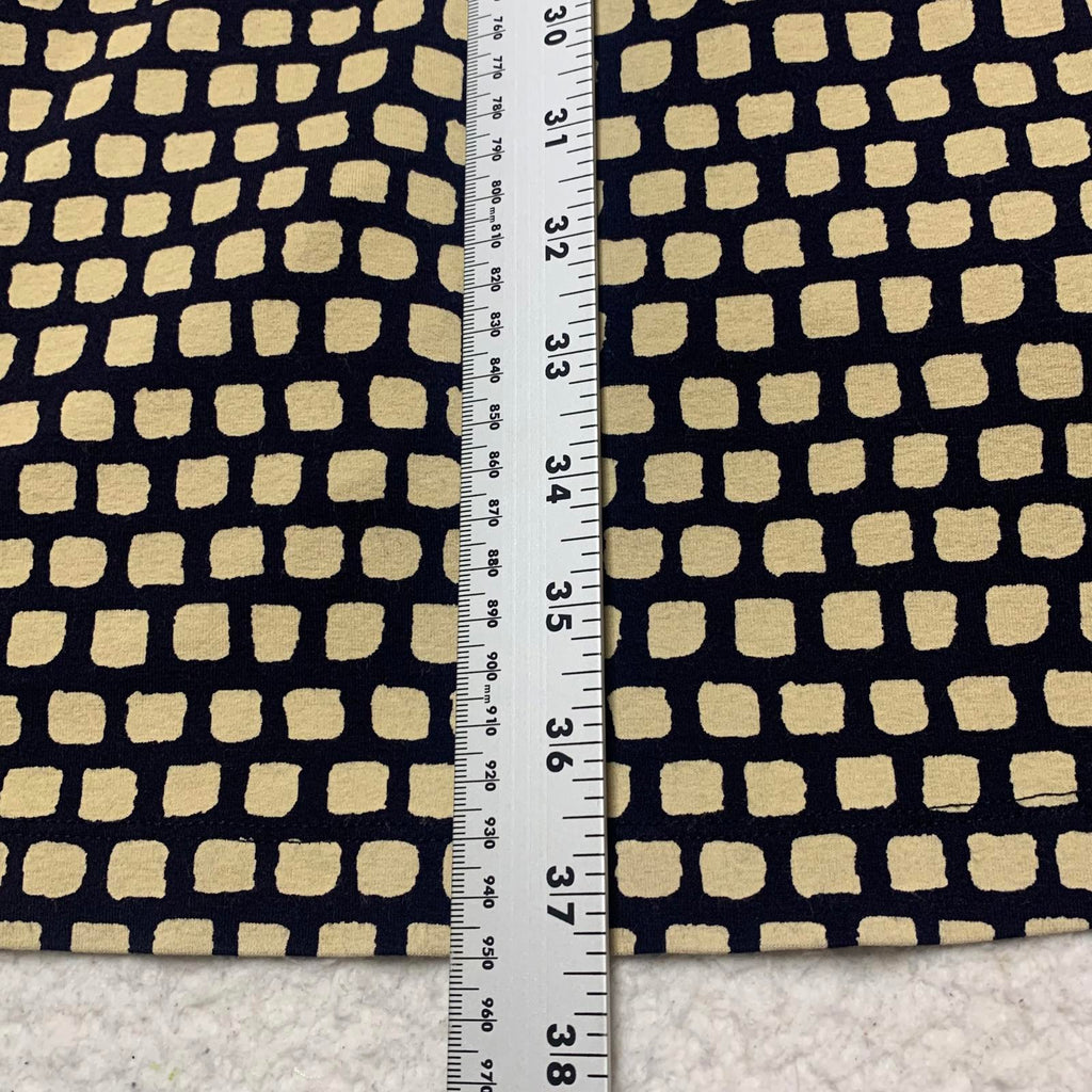 Vestido cruzado con escote en V y mangas 3/4 en color beige y negro de Banana Republic para mujer