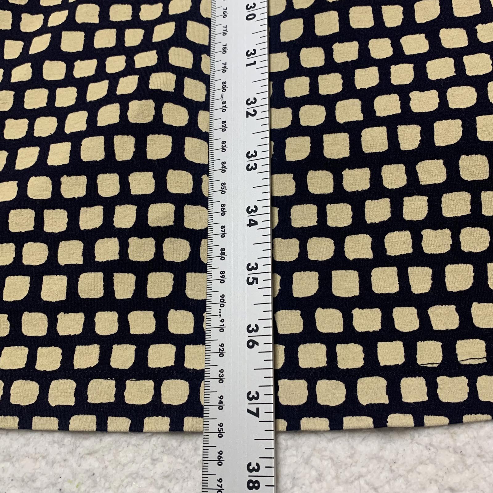 Vestido cruzado con escote en V y mangas 3/4 en color beige y negro de Banana Republic para mujer