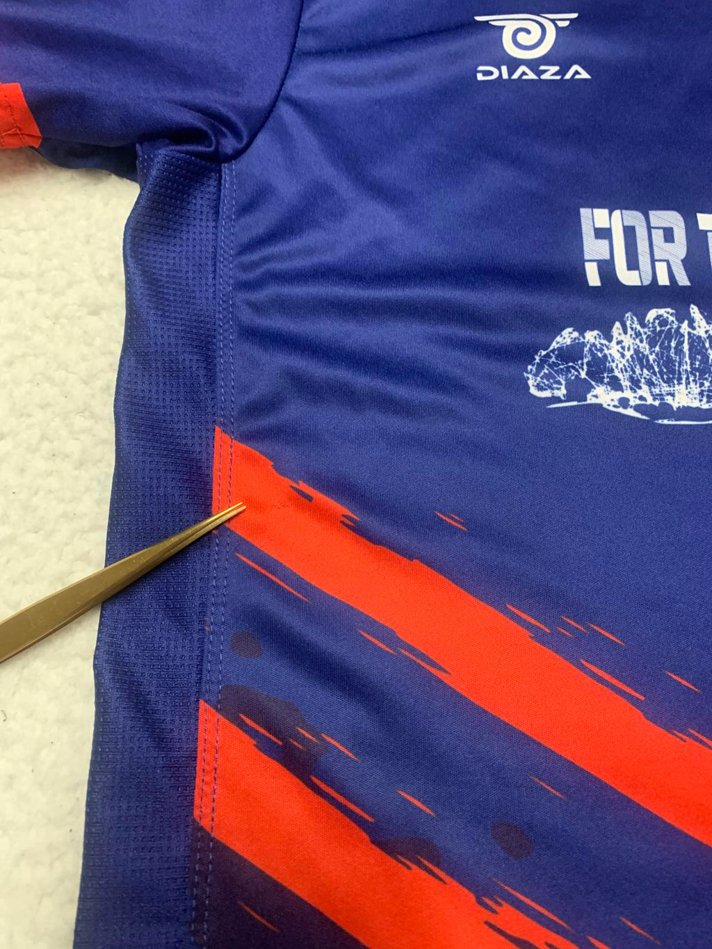 Camiseta de fútbol juvenil de los Rough Riders de Diaza Design en azul medio y rojo de EE. UU.