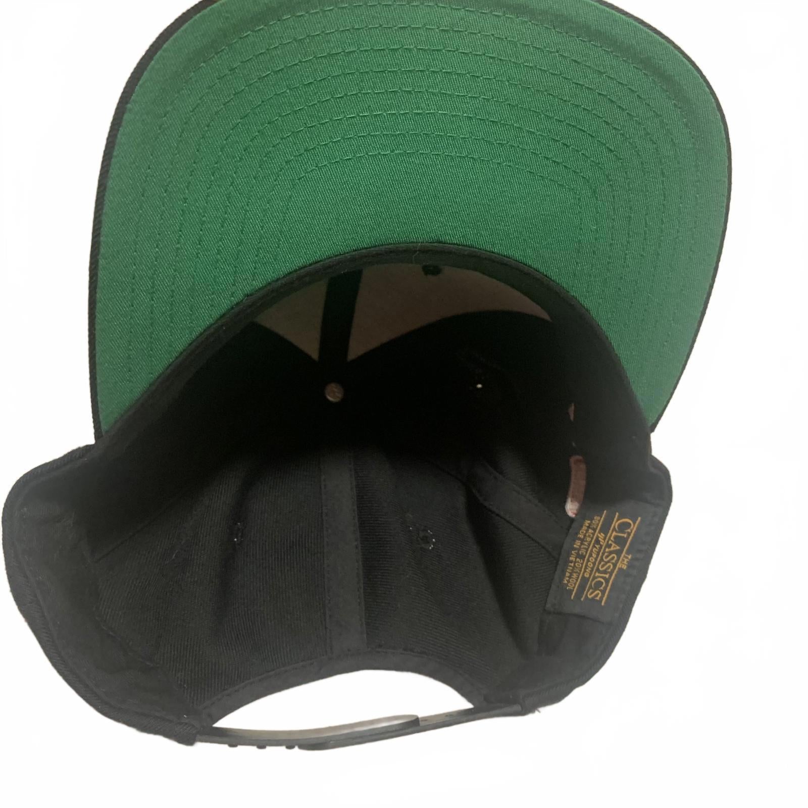 Gorra de béisbol clásica negra con cierre a presión y bordado naranja "Quiero Romi"