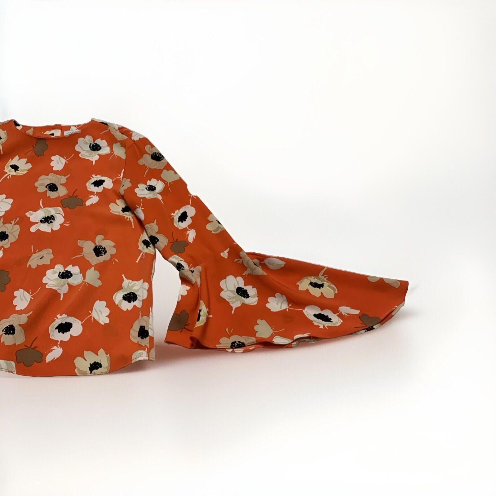 Blusa con mangas acampanadas y estampado floral naranja de Carmen Marc Valvo para mujer, talla 8