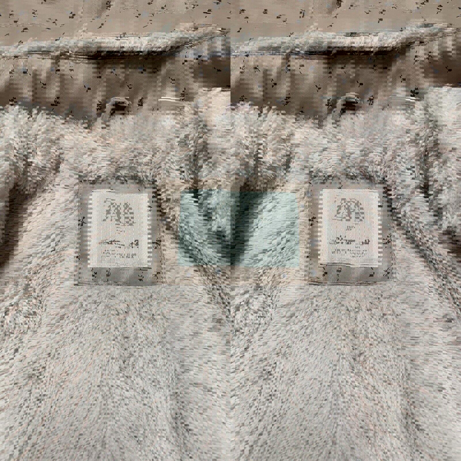 Chaqueta impermeable con capucha y forro polar con estampado floral rosa para niña de Zara, talla 3-4 años