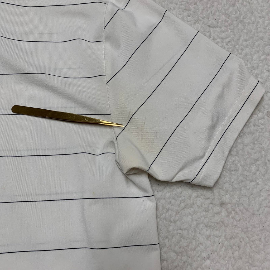 Polo Under Armour Heat Gear de rayas blancas y negras para hombre, talla mediana