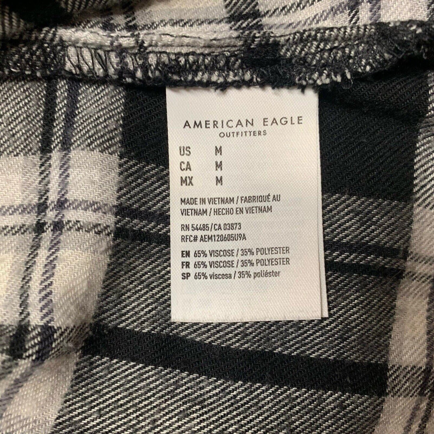 American Eagle Plaid Flannel Tunic Size Small Black White Pin Tuck Jegging Fit M