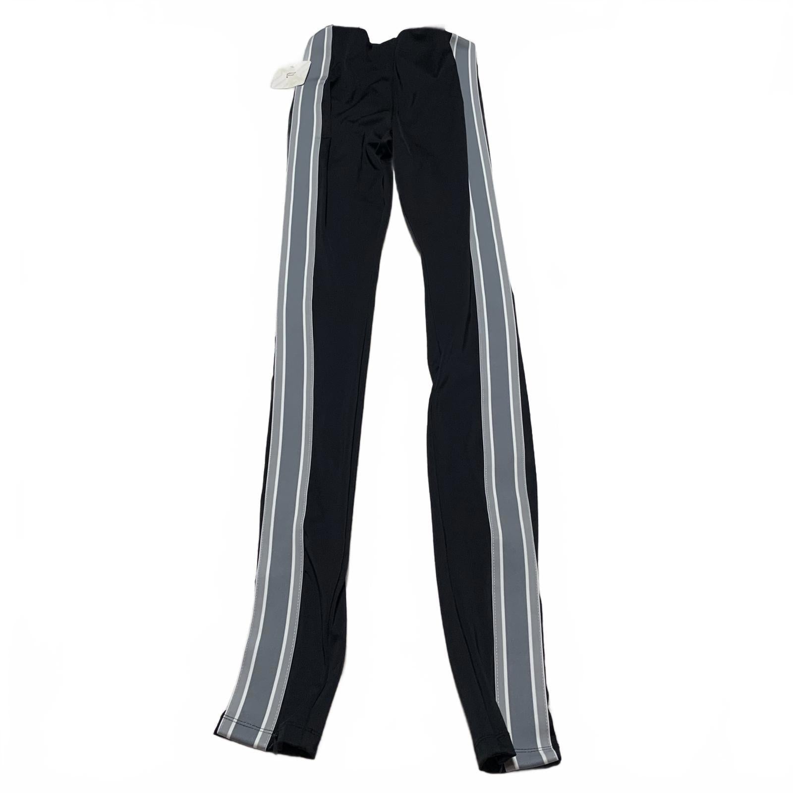 Leggings negros con rayas laterales y cremalleras en los tobillos de Fabletic para mujer, talla pequeña