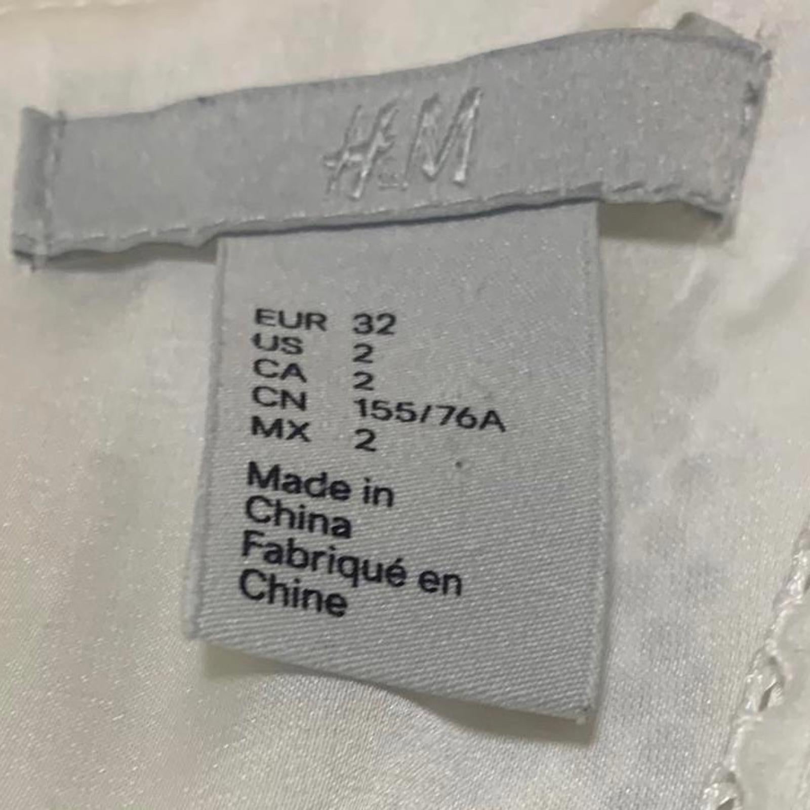 Vestido blanco sin mangas con escote en V y largo hasta la rodilla con estampado texturizado de H&amp;M para mujer, talla 2