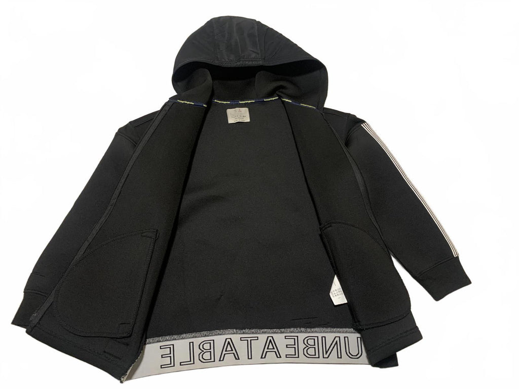 Sudadera con capucha y cremallera negra para niño de la colección Zara Kids, talla 9
