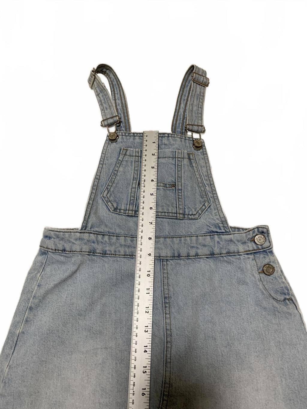 Falda vaquera desgastada con lavado claro y dobladillo deshilachado de Zara para niñas, talla 13/14