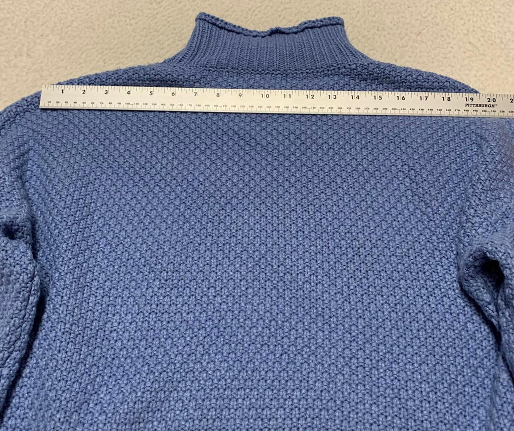 Suéter unisex azul con cuello redondo y textura para mujer