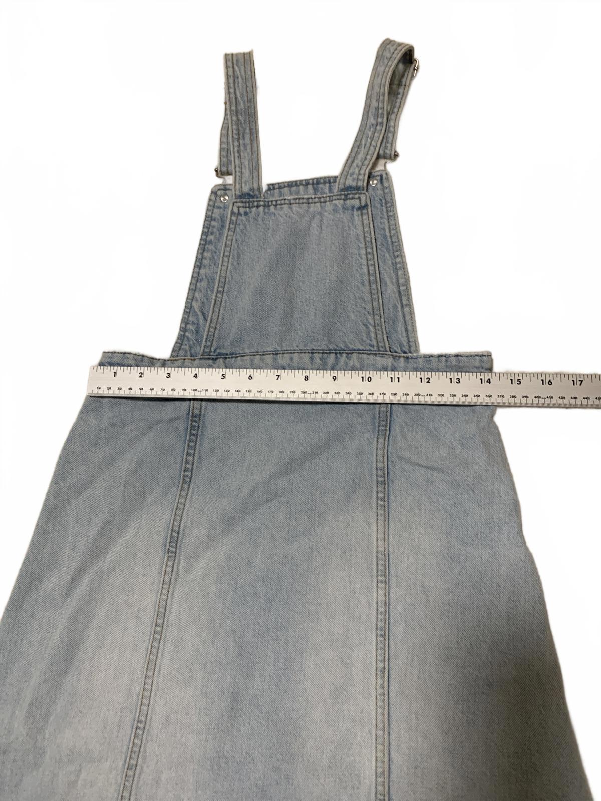 Falda vaquera desgastada con lavado claro y dobladillo deshilachado de Zara para niñas, talla 13/14