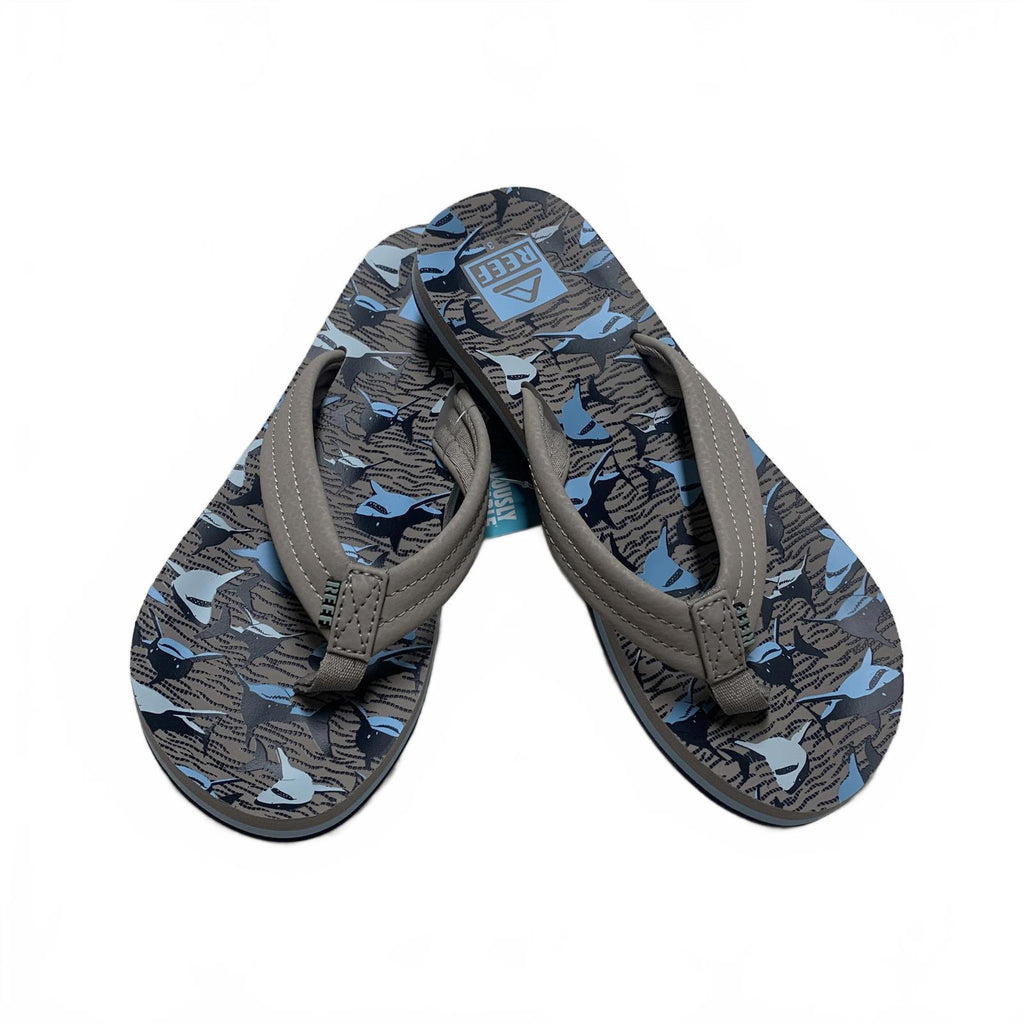Chanclas Reef Kids Ahi talla 3 color canela con diseño de tiburones, divertidas y elegantes