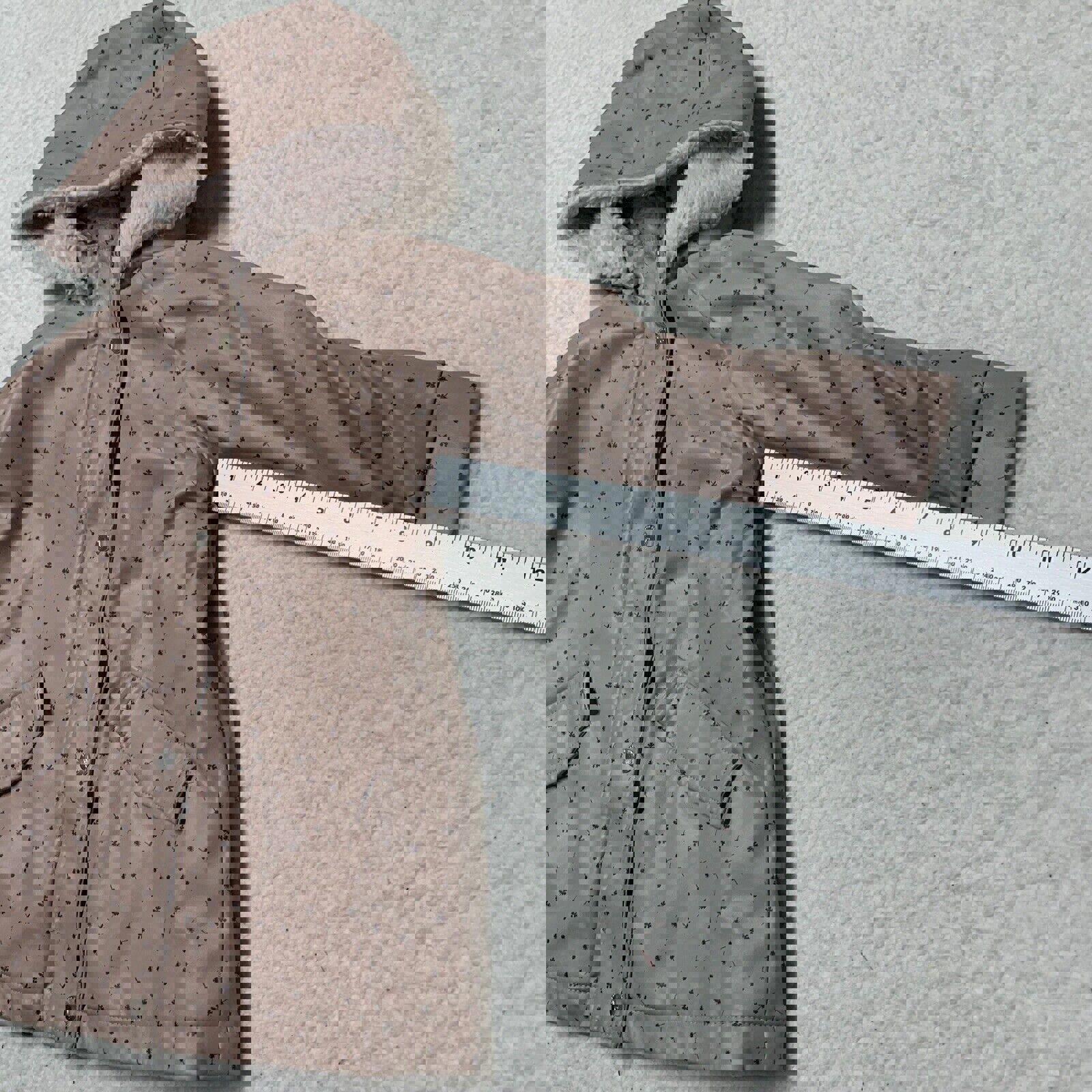 Chaqueta impermeable con capucha y forro polar con estampado floral rosa para niña de Zara, talla 3-4 años