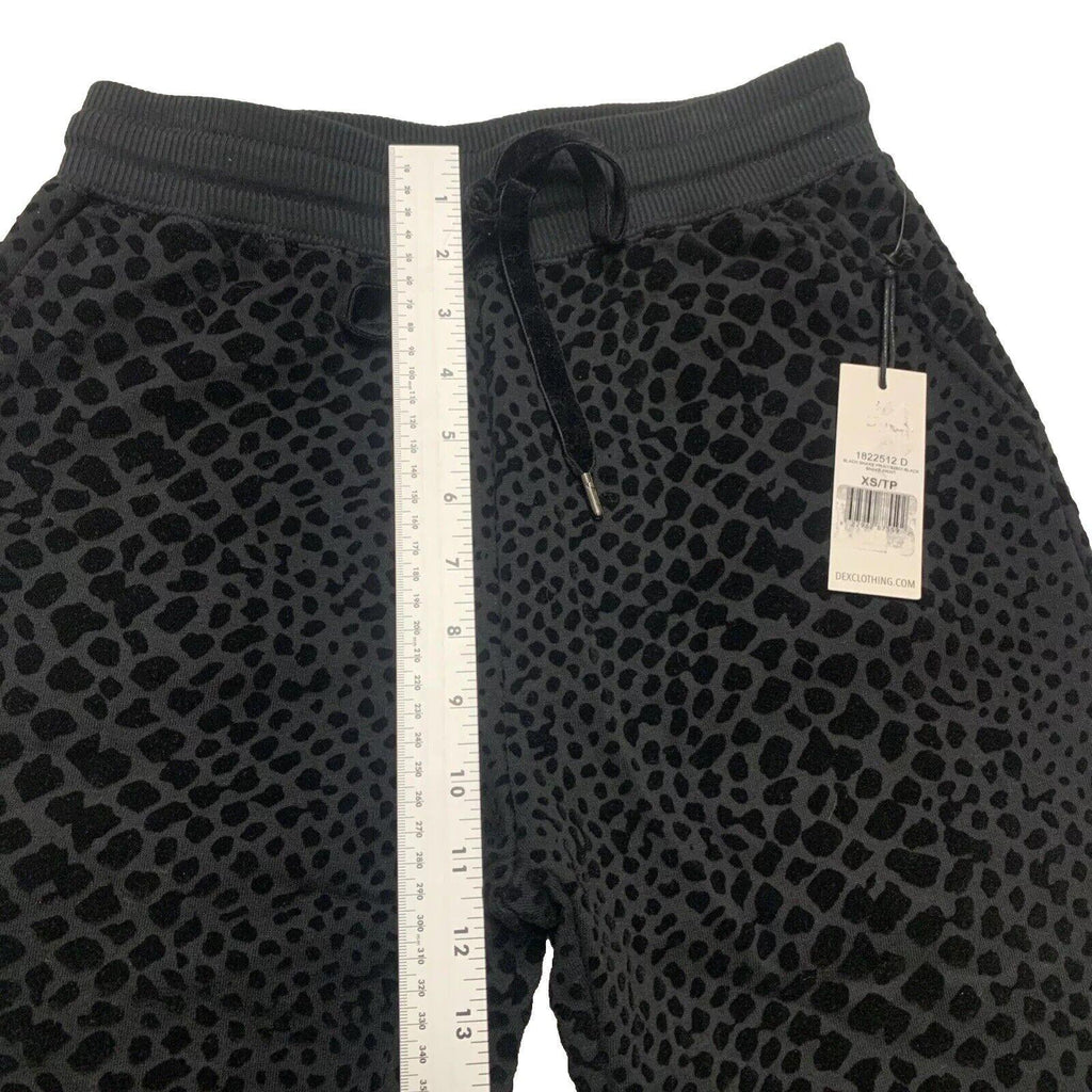 Leggings negros de talla extragrande para mujer de Dex Clothing, pantalones deportivos con estampado de serpiente y terciopelo