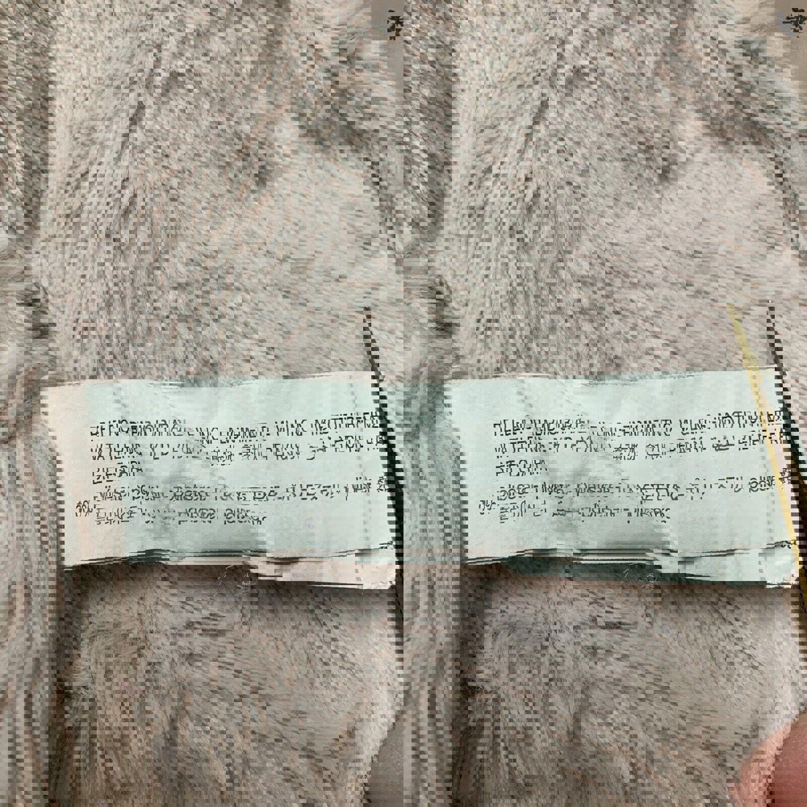 Chaqueta impermeable con capucha y forro polar con estampado floral rosa para niña de Zara, talla 3-4 años