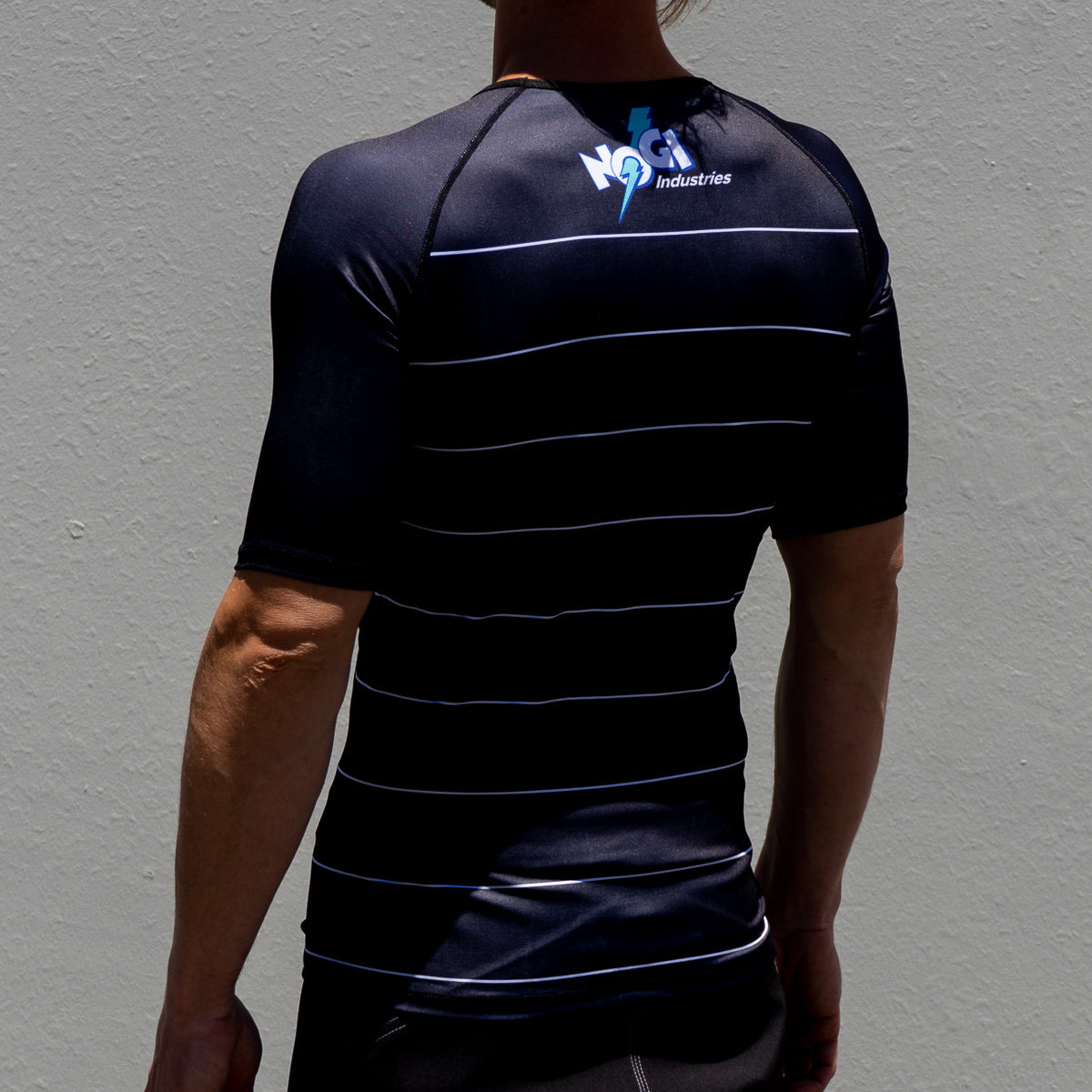 Camiseta Energy Rash Guard de Nogi Industries de manga corta - NEGRA