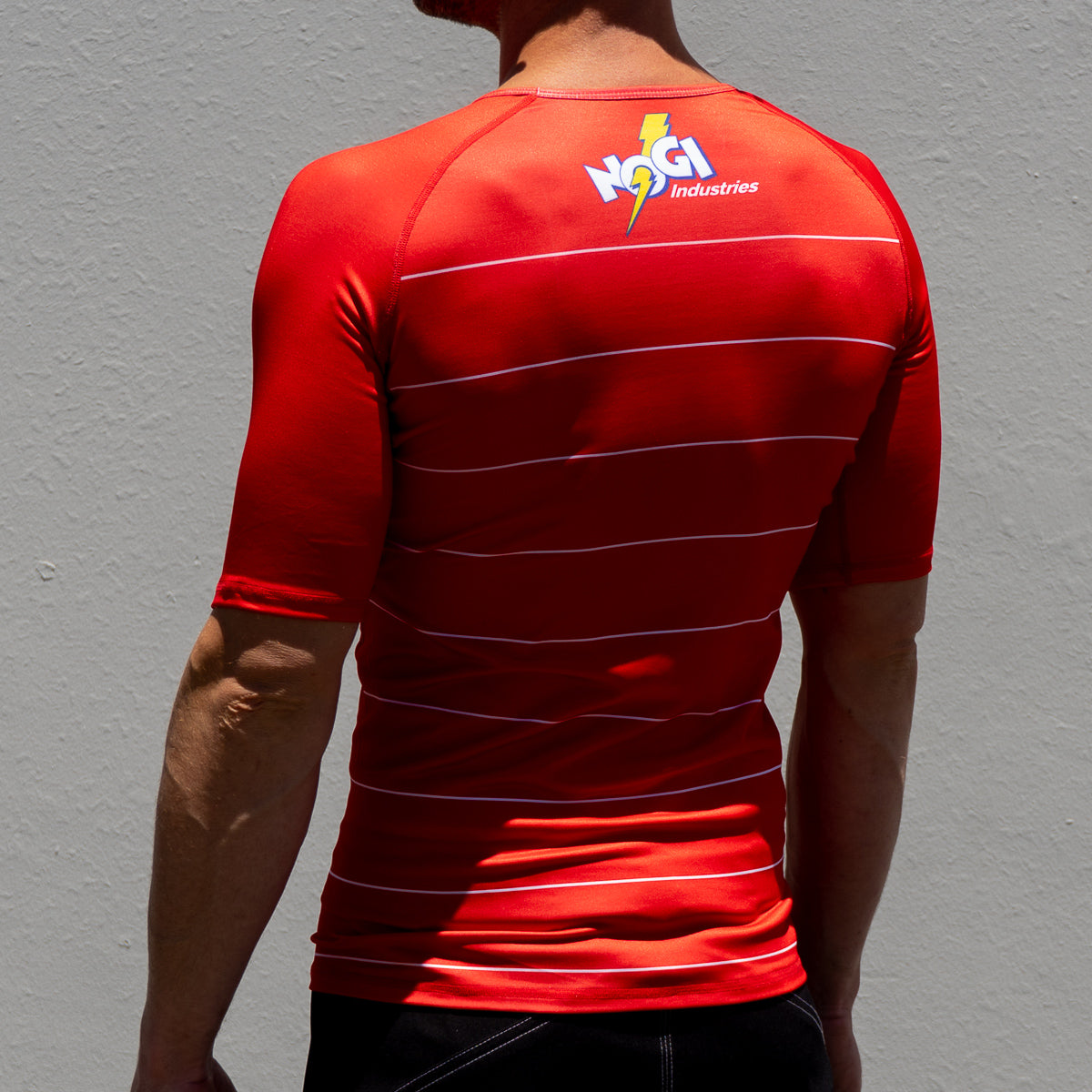Camiseta Energy Rash Guard de Nogi Industries, manga corta, color rojo