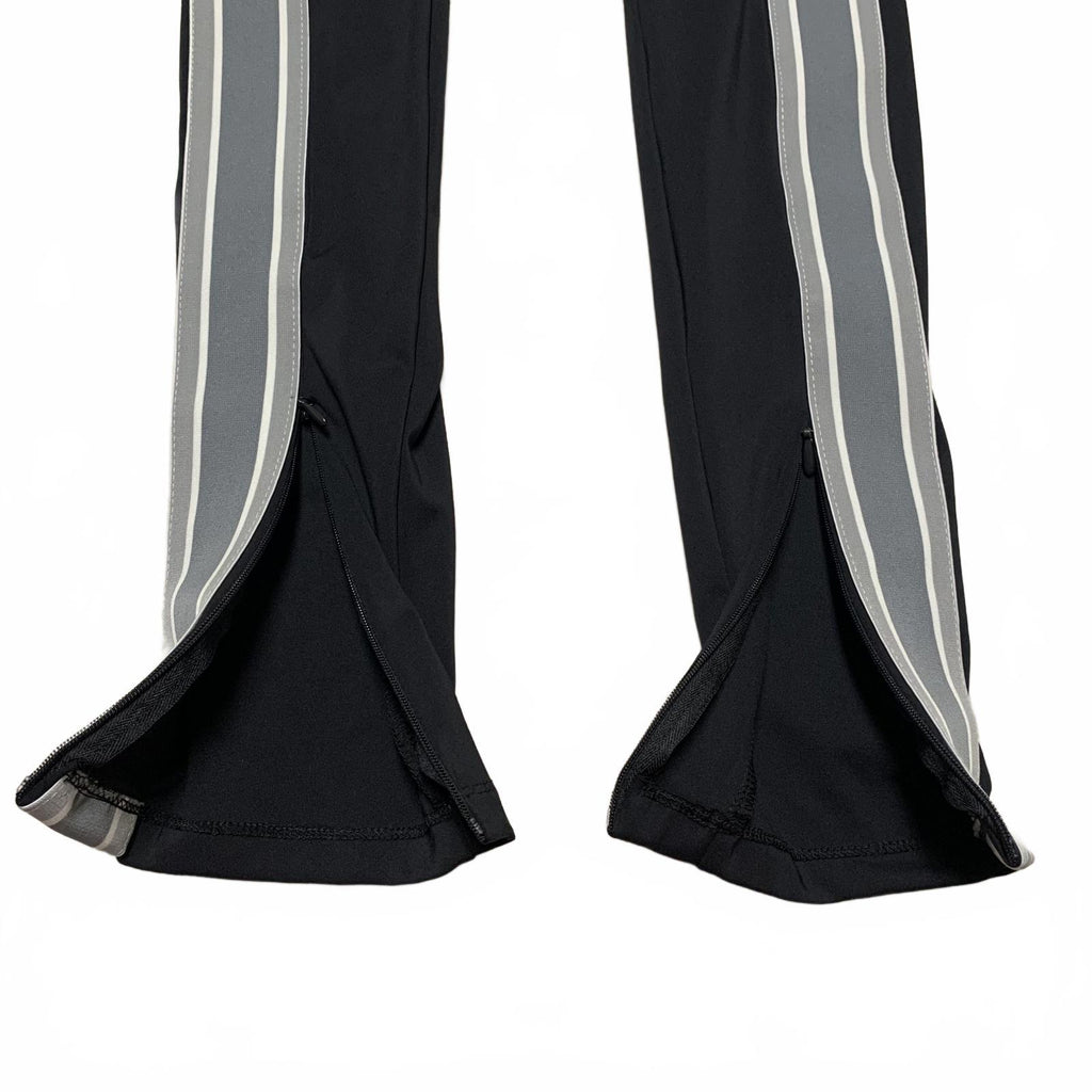 Leggings negros con rayas laterales y cremalleras en los tobillos de Fabletic para mujer, talla pequeña