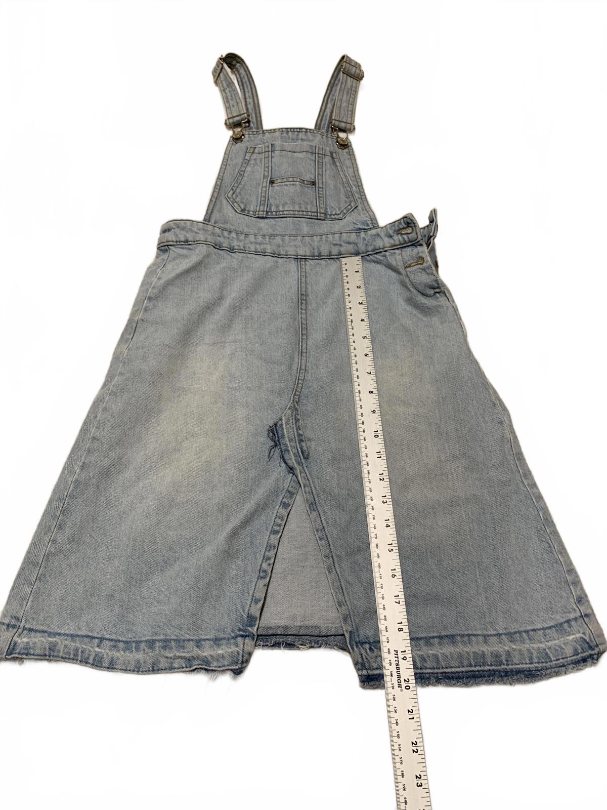 Falda vaquera desgastada con lavado claro y dobladillo deshilachado de Zara para niñas, talla 13/14