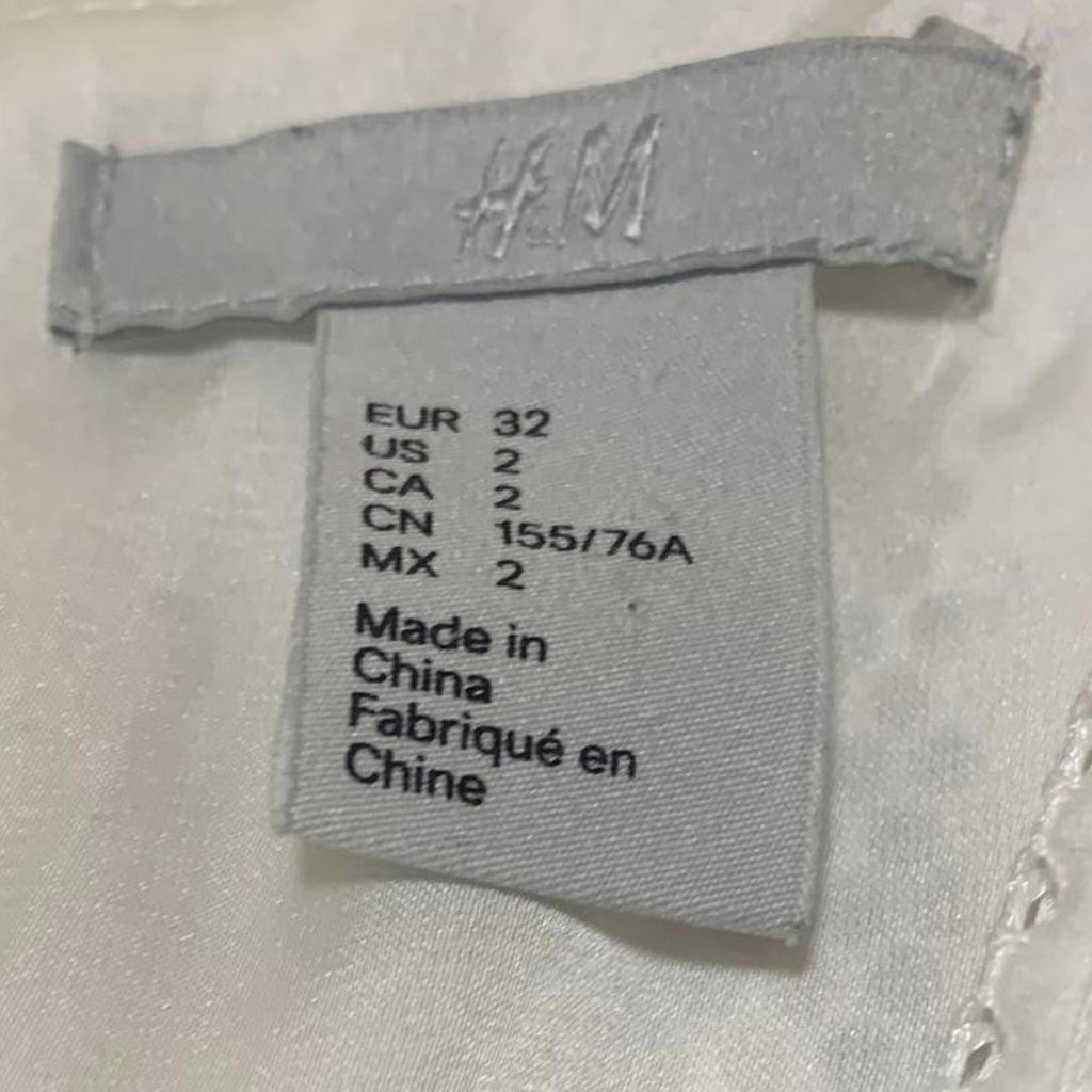 Vestido blanco sin mangas con escote en V y largo hasta la rodilla con estampado texturizado de H&amp;M para mujer, talla 2