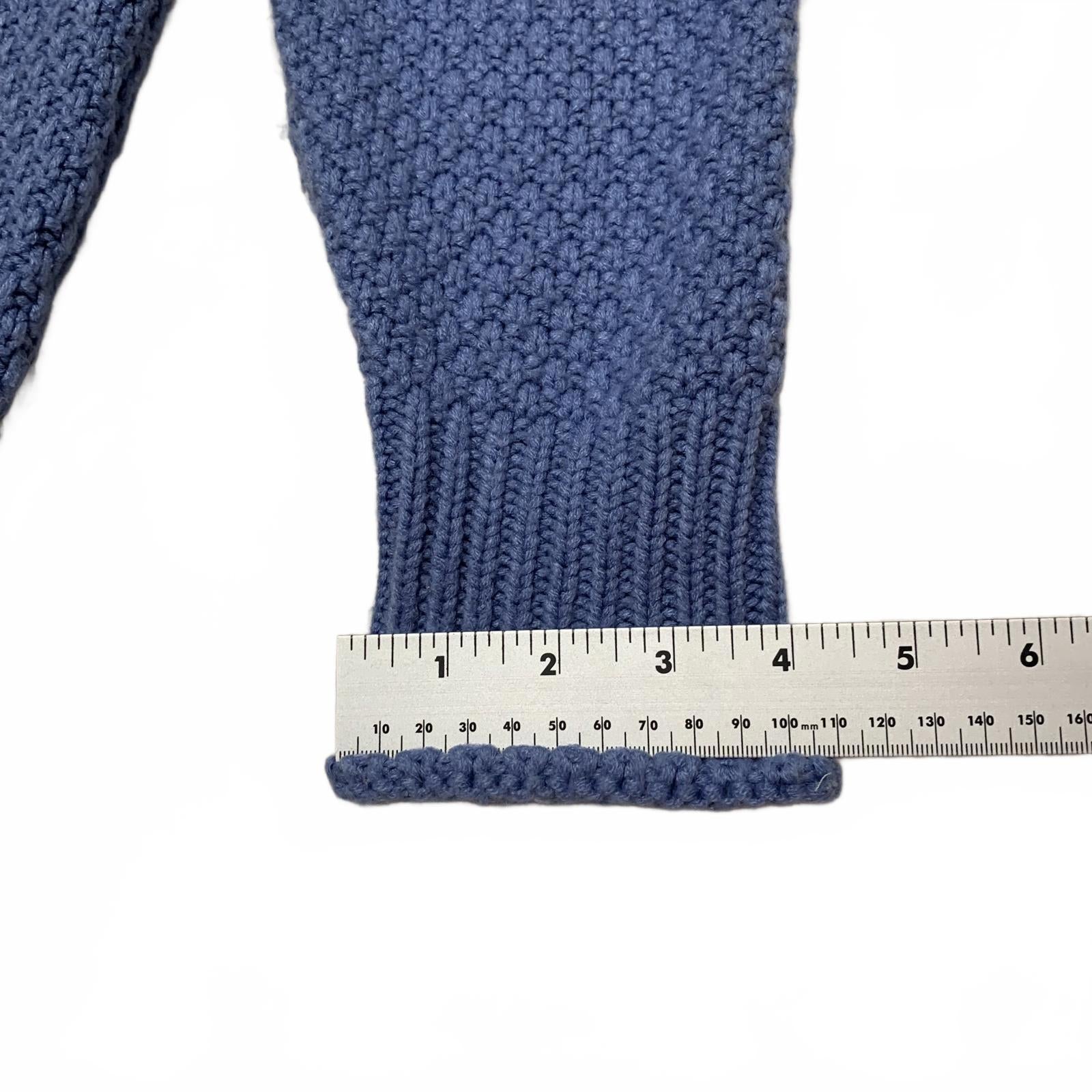 Suéter unisex azul con cuello redondo y textura para mujer