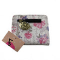 Cartera plegable con broche de 8,5 x 10 cm para niña con estampado floral blanco pastel de LB Money