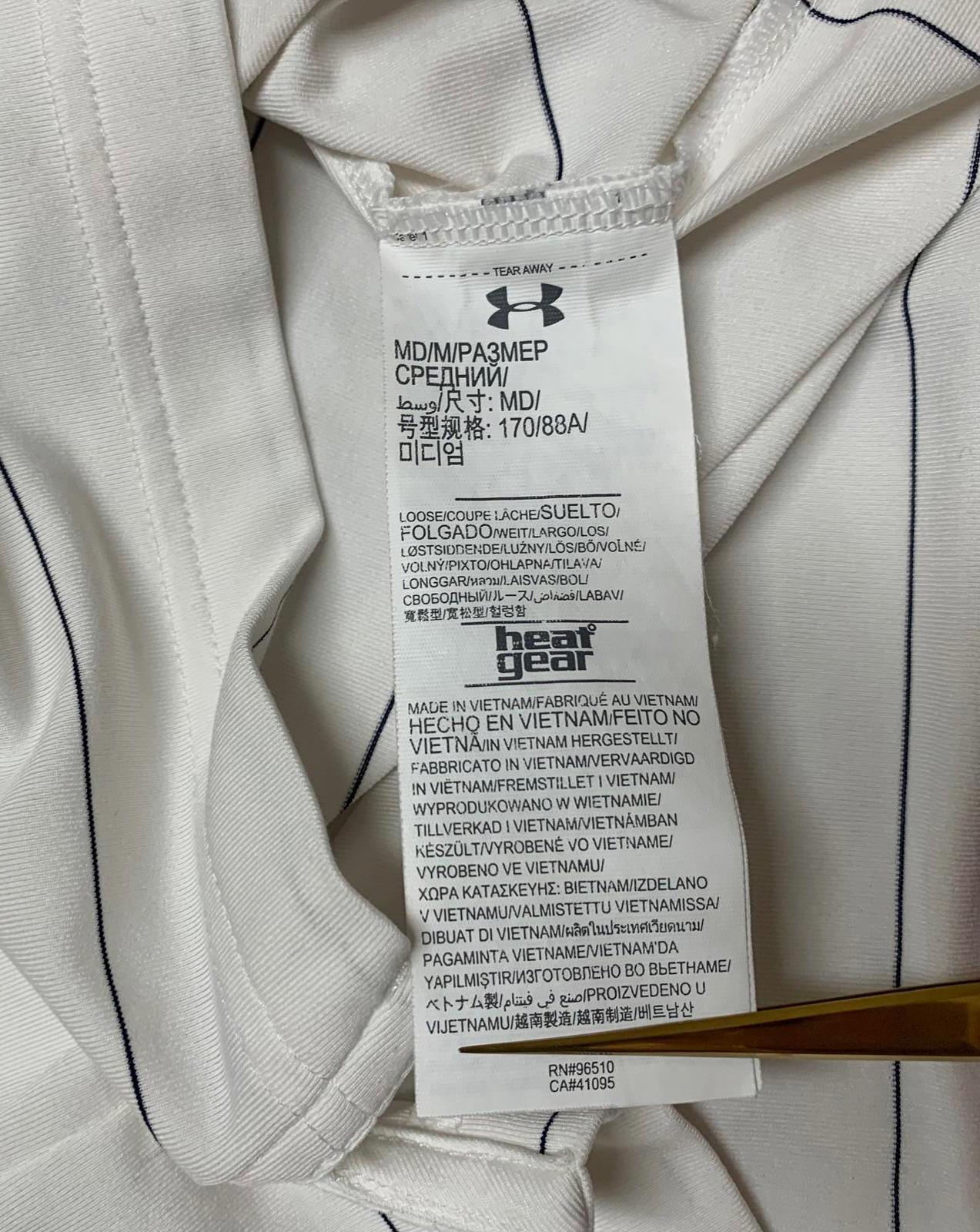 Polo Under Armour Heat Gear de rayas blancas y negras para hombre, talla mediana