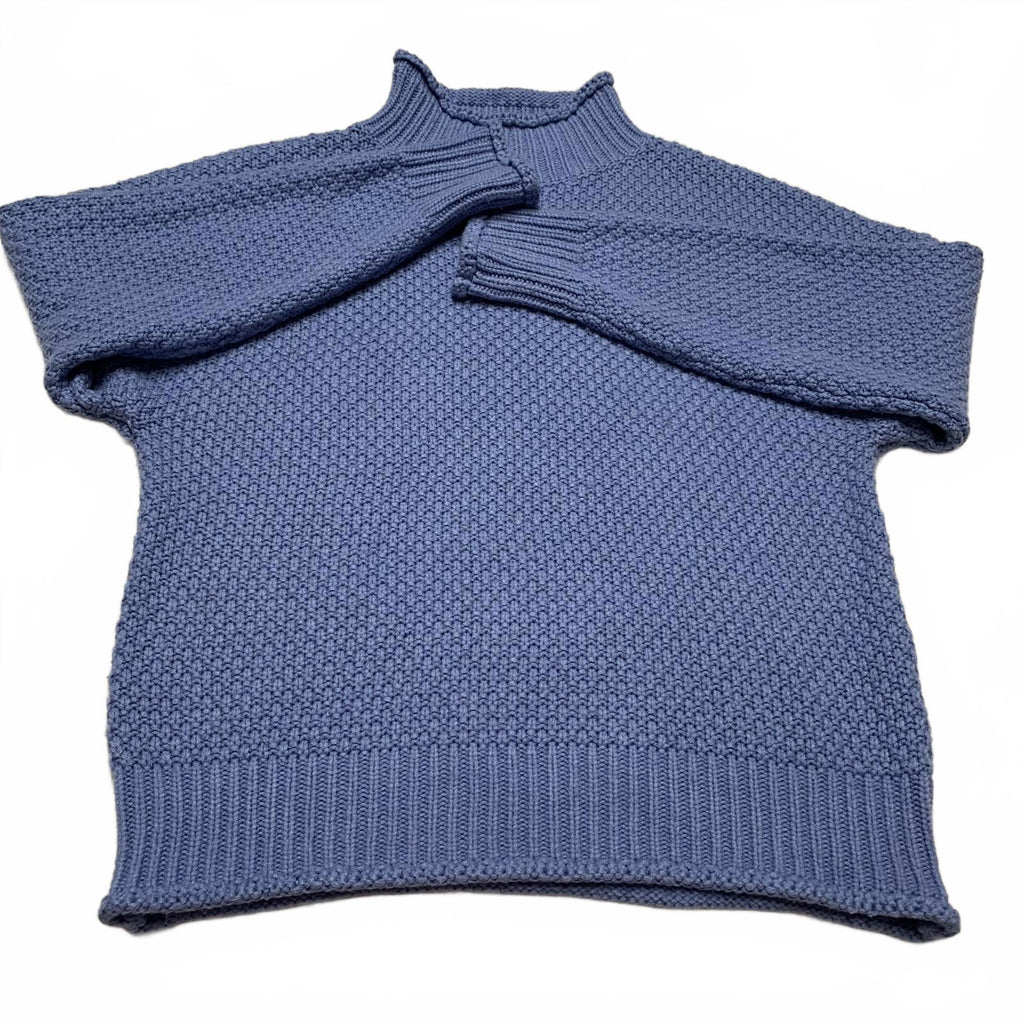 Suéter unisex azul con cuello redondo y textura para mujer