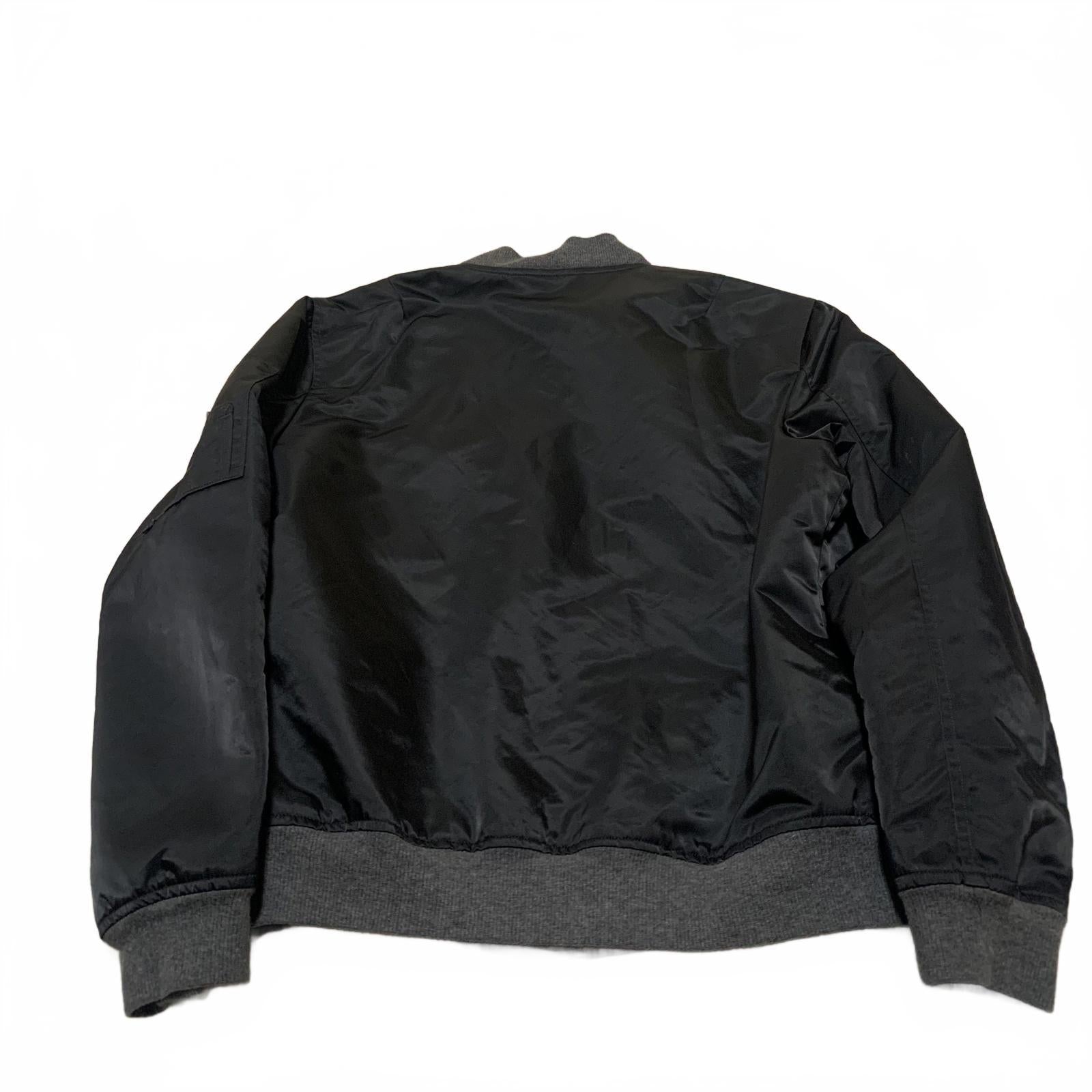 Chaqueta bomber negra vintage de los años 90 de Champion Co. para hombre, talla M, puños acanalados grises.