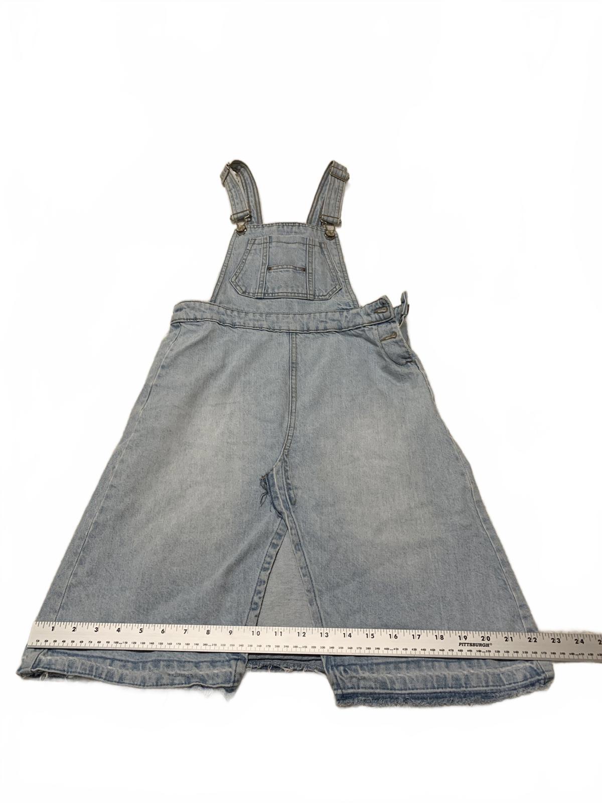 Falda vaquera desgastada con lavado claro y dobladillo deshilachado de Zara para niñas, talla 13/14