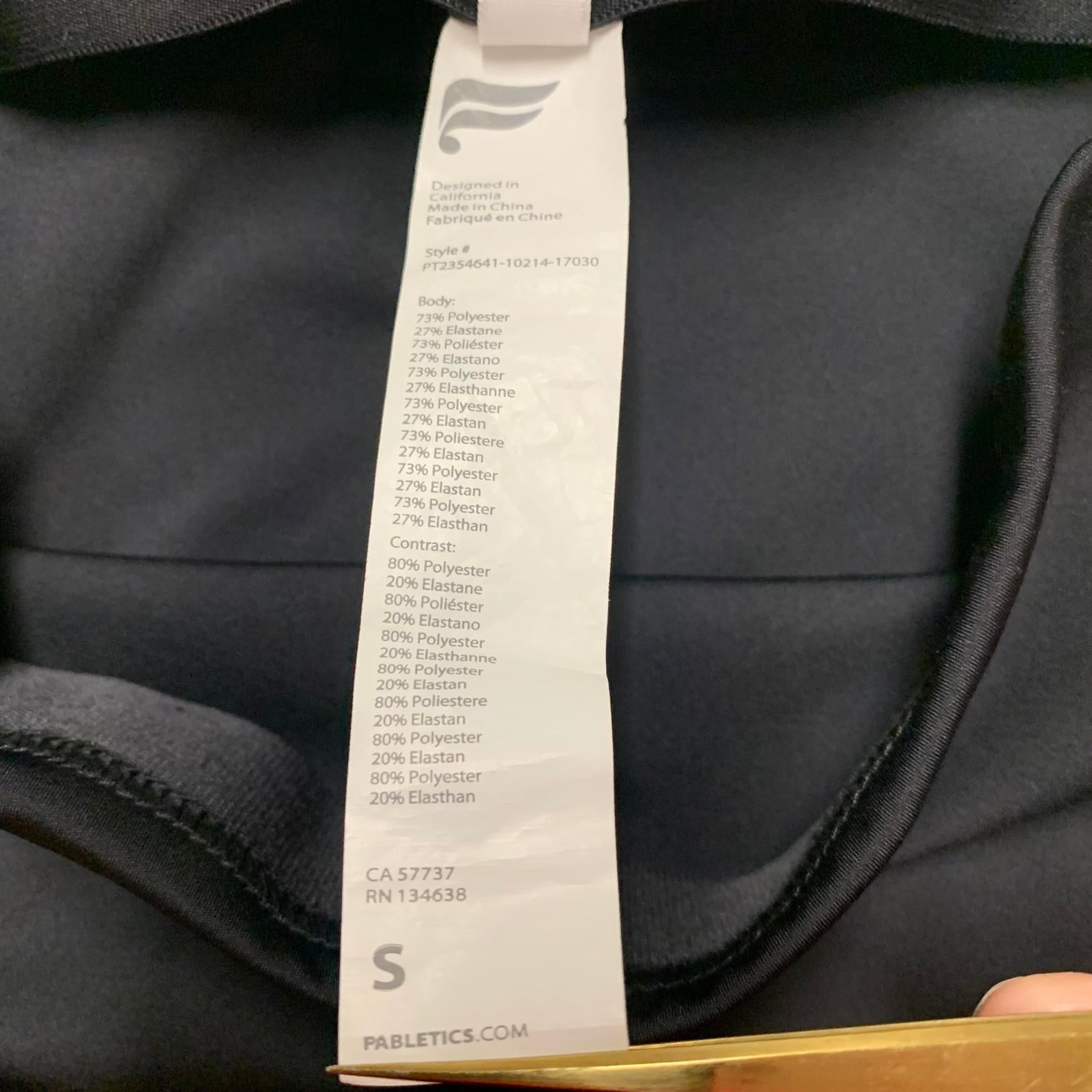 Leggings negros con rayas laterales y cremalleras en los tobillos de Fabletic para mujer, talla pequeña