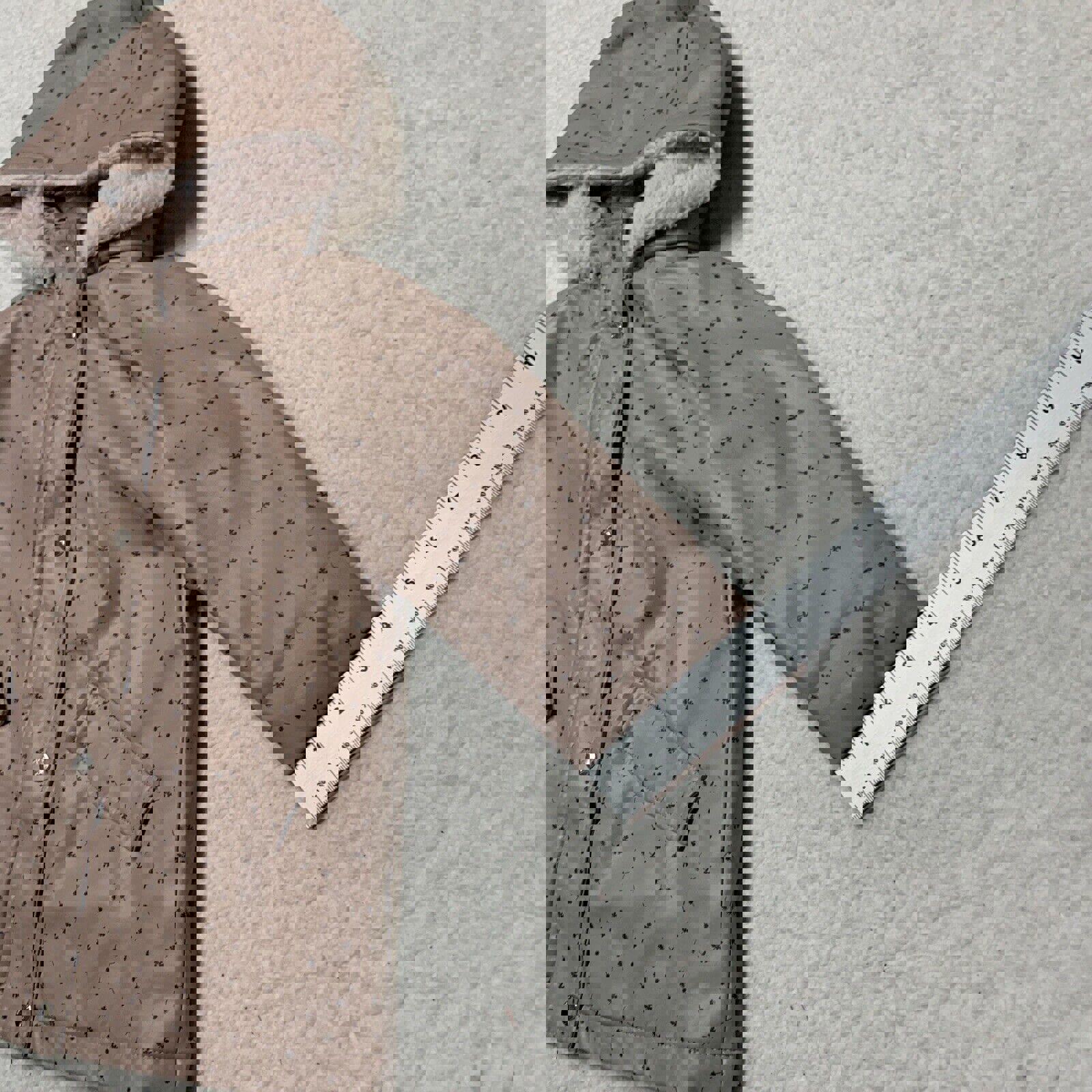 Chaqueta impermeable con capucha y forro polar con estampado floral rosa para niña de Zara, talla 3-4 años