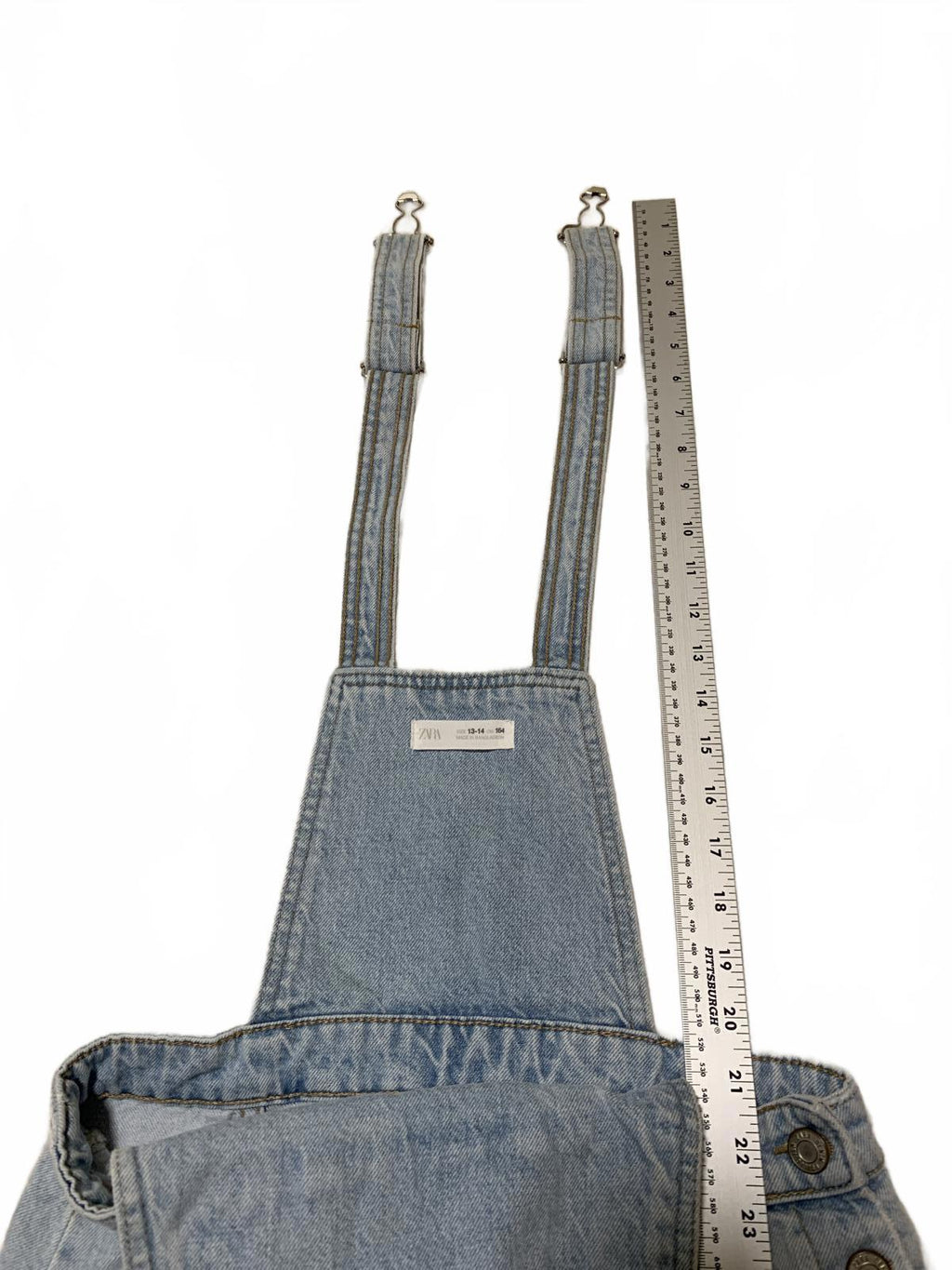 Falda vaquera desgastada con lavado claro y dobladillo deshilachado de Zara para niñas, talla 13/14