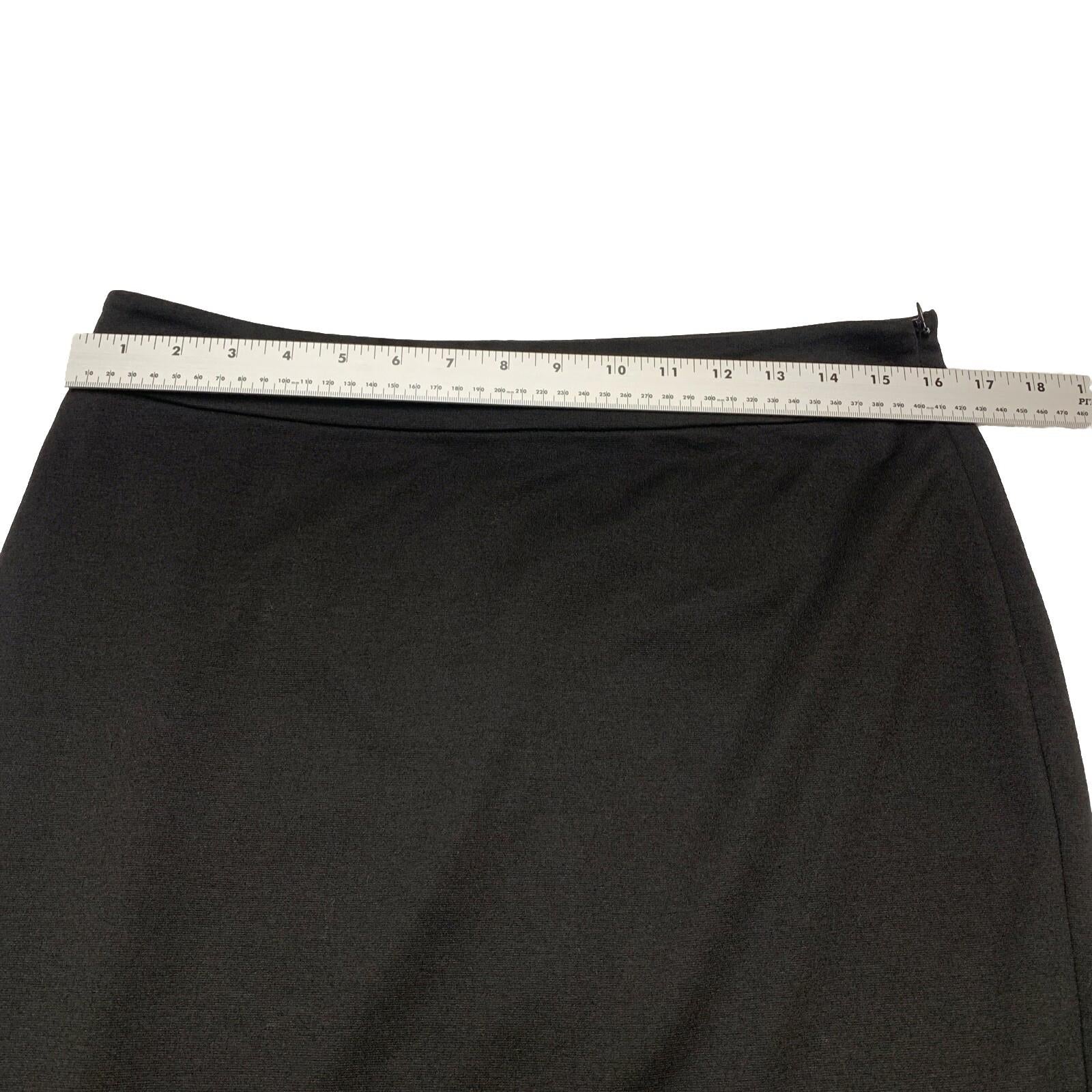 Falda tubo negra con trabillas para cinturón y cremallera lateral hasta la rodilla, talla 8, para mujer