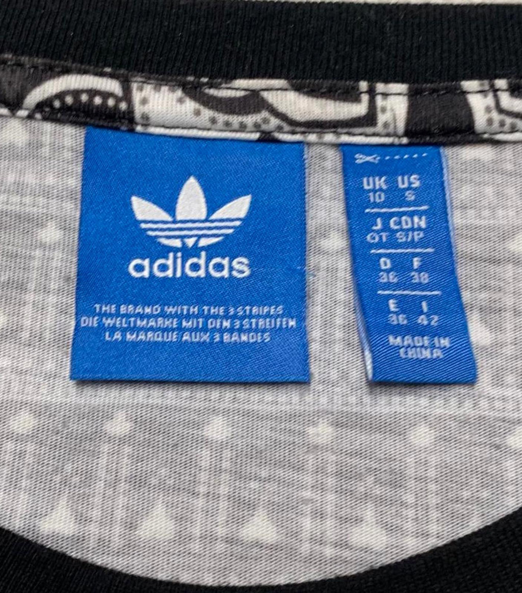 Camiseta negra Adidas talla S con diseño de logotipo gráfico de plumas de cachemira