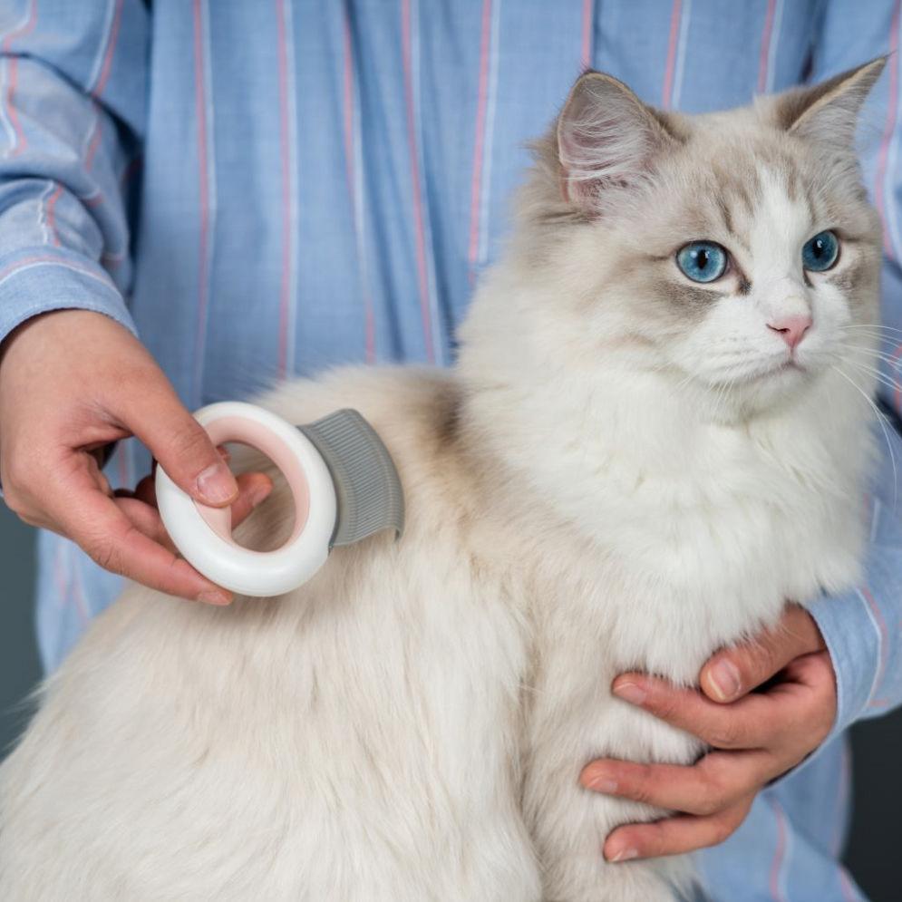 Peine rastrillo flexible de viaje portátil 'Knuckler' para mascotas de Pet Life ®